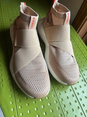 Sorel Slip-On Sneakers in Blush with Coral Logo